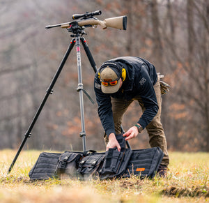 Person hunting with BONE-DRI Rust Prevention Dual Rifle Case