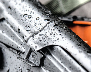 Close up of water droplets on a gun