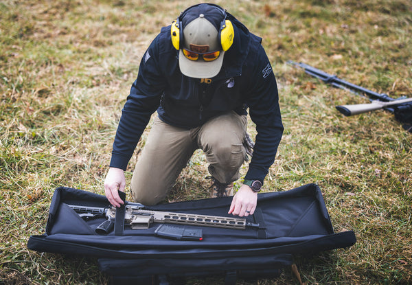 BONE-DRI, BONE DRI, Dual Rifle Case, Soft Rifle Case, Soft Dual Rifle Case, Prevents Rust, Absorbs Moisture, Gun Range, Man With Rifle Case, Rifle Case Backpack, Dual Rifle Case Backpack, AR, AR-15